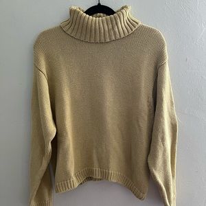 Jeanne Pierre mustardy tan turtleneck sweater